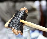 23 người ăn thịt trăn bị nhiễm loại giun gì ?